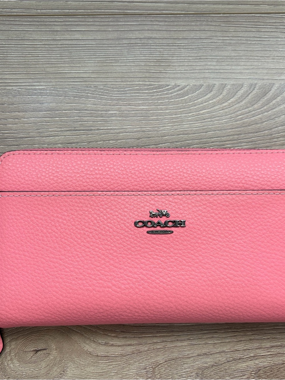 COACH Pink Pebbled Leather Zip Wristlet with Logo